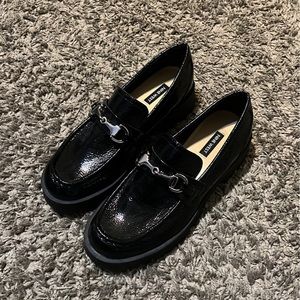 Black loafers